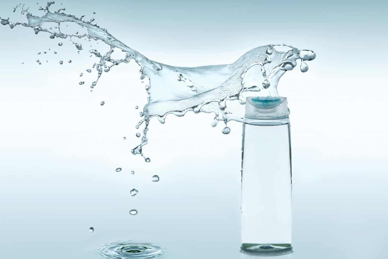 a see-through bottle of water in front of a clear background